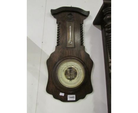 An oak wall barometer