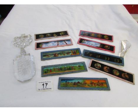 A small collection of coloured magic lantern slides, glass scent bottle a/f and 2 glass stoppers