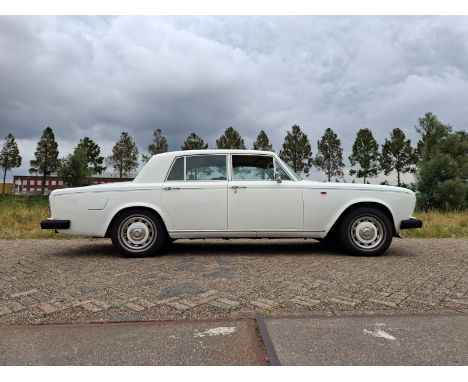 The Rolls-Royce Silver Shadow II, first registered on November 7, 1977, is presented in a classic creme color. Registered as 