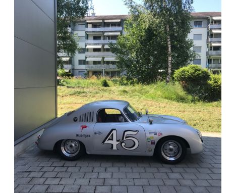 This Porsche 356 A, first registered on June 15, 1956, is a classic car with a rich history and notable modifications. It fea