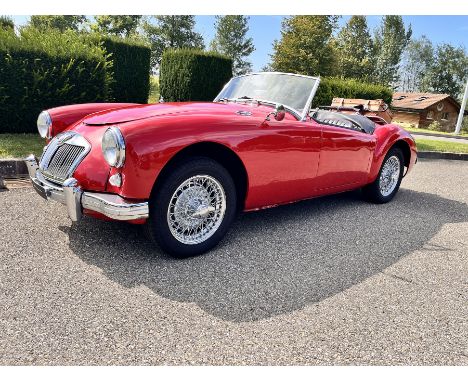 The 1957 MG Model A 1500, finished in a classic red, is a notable example of mid-century British automotive design. This vehi