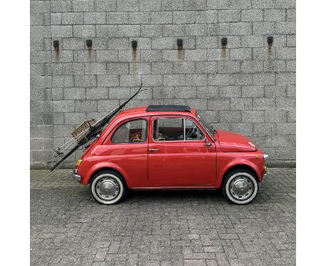 The Fiat 500L, first registered in 1958, is a classic model painted in a striking red. It is registered as an oldtimer and co
