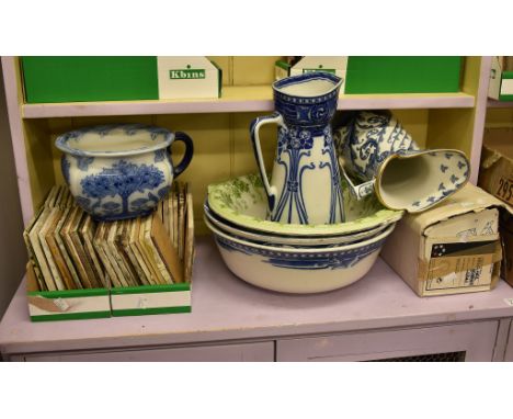A Doulton Chatham pattern basin and jug, a Doulton Aubrey pattern basin and jug, a further green basin, a Doulton Tudor chamb