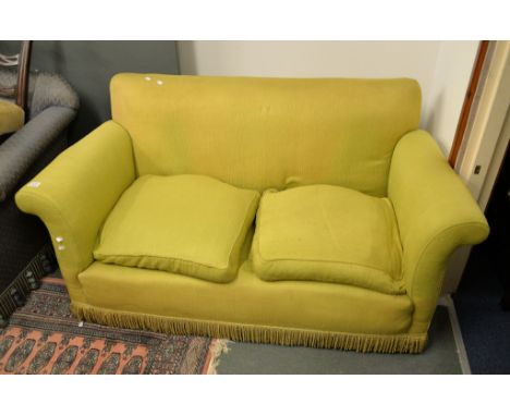 A green-yellow upholstered two seat sofa, 145cm long 