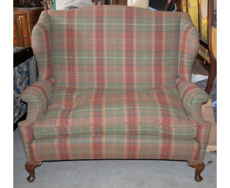 A high backed sofa in tartan style upholstery 