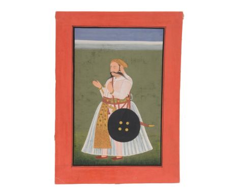 An Indian portrait of a Ruler,    Mewar, Rajasthan, late 18th century, the plump one-eyed figure carrying sword and shield an