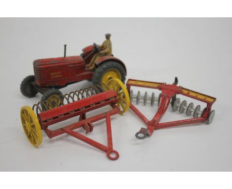 VINTAGE MASSEY HARRIS DIE CAST TRACTOR, PLAY WORN WITH TWO ATTACHMENTS 