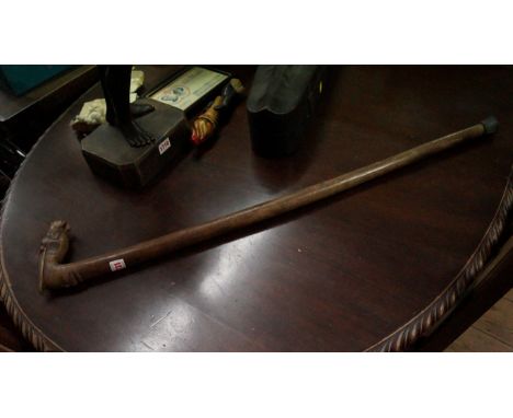 A novelty carved wood walking stick, with horse's head terminal, indistinctly inscribed. 