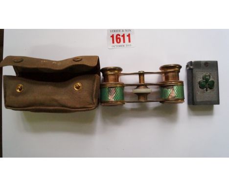 An old Flintop lighter, inscribed 'J B Brindle, RMS Titanic, 14-4-1912', and with enamel shamrock; together with a pair of gi