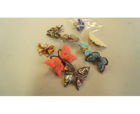 A 925 and bright blue enamel butterfly brooch; together with a small 925 butterfly pendant; and eight other butterfly brooche