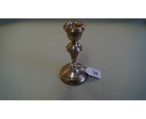 A silver candlestick, by W I Broadway & Co., Birmingham 1966, 14cm high.
