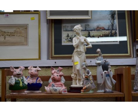 Two Lladro figures; together with a Nao figure; and four Wade Nat West pigs, (two s.d.); and another figure. 