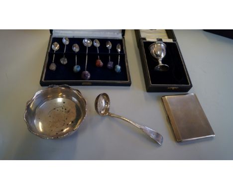 An Edwardian silver pedestal bowl, by Alfred Marston, Birmingham 1910, with shaped rim, 10cm diameter; together with a silver