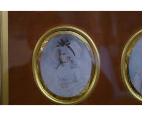 Manner of Richard Cosway, a set of three half-length portrait miniatures of ladies, unsigned, on ivory, 11.7 x 9.5cm oval, fr