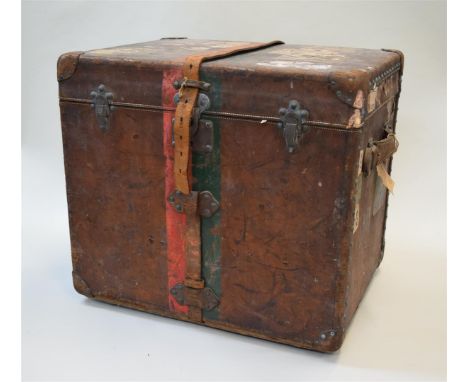 A rare circa 1900 Louis Vuitton leather trunk, labelled to the interior, the lock numbered 021013, 55.5cm high x 62cm wide x 