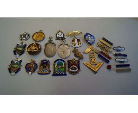 A collection of silver Masonic medals and similar, to include eleven silver gilt and enamel examples, 400g gross.