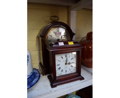 A 1920s mahogany mantel clock, with silvered dial and associated quartz movement; together with another timepiece. 