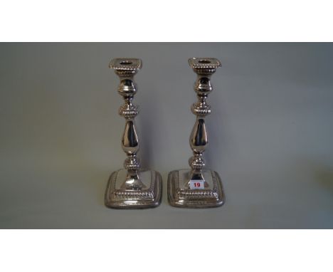 A pair of George III silver candlesticks, by John Watson, Sheffield 1808, 30cm, weighted. Condition Report: There is no struc