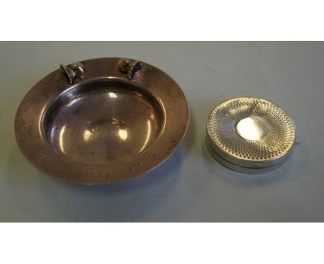 A small silver circular bowl, surmounted with two gilt doves and inscribed with date, 9.5cm diameter, 78.5g; together with a 