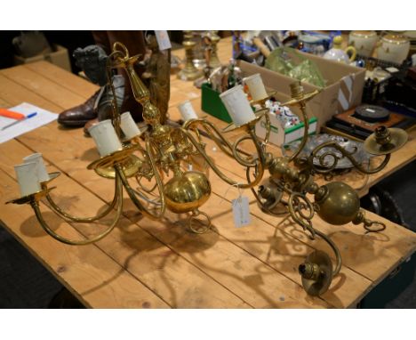A glazed hall lantern and two Dutch type brass chandeliers 
