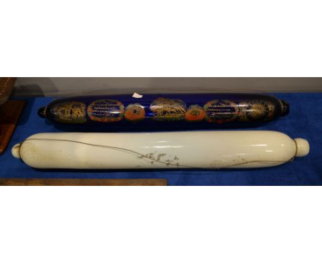 An English blue glass rolling pin frigger, painted and gilt with maritime subjects and verse, 74cm long, and an opaque plain 