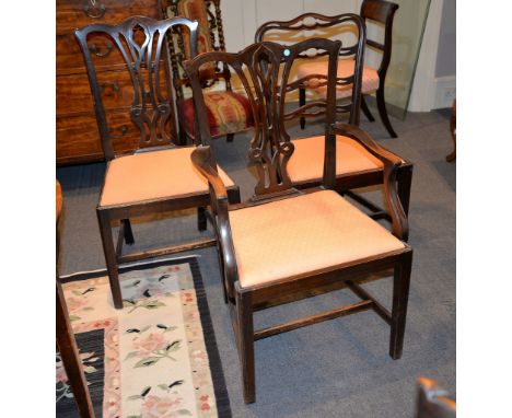 A set of six mahogany dining chairs in George III style, including two armchairs, together with two ladder back dining chairs