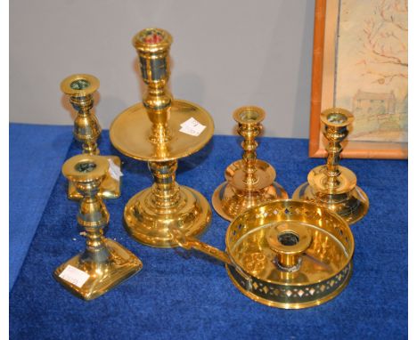 A 17th century  Heemskerk  type brass candlestick with pierced nozzle central drip pan, knopped stem and domed foot, 24cm hig