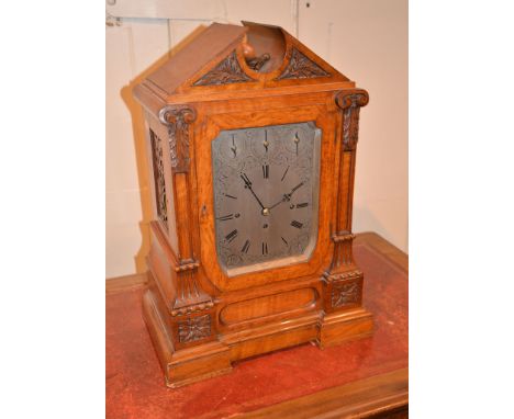 A late Victorian oak cased bracket clock, with eight-day three-train movement, the 7 1/2 inch silvered dial with a choice of 