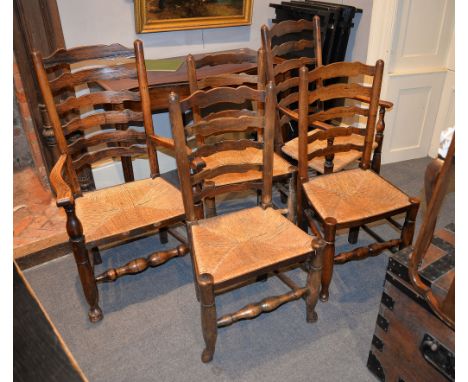 A set of eight elm and ladder back dining chairs each with rush seat, 20th century 