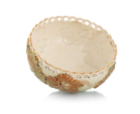 ROYAL WORCESTER BOWL, LATE 19TH / EARLY 20TH CENTURY with pierced rim, the basket weave body moulded with lustrous green and 