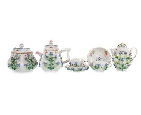 SITZENDORF PORCELAIN MINIATURE TEA SET, LATE 19TH CENTURY comprising teapot, coffee pot, covered sugar bowl, and two teacups 