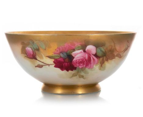 ROYAL WORCESTER BOWL, CIRCA 1924 hand painted with roses with gilt highlight, puce printed marked to base26.5cm diameter