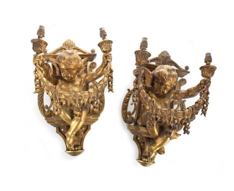 PAIR OF FRENCH ORMOLU WALL SCONCES LATE 19TH CENTURY each modelled with winged putto holding a loft a pair of beaded foliate 