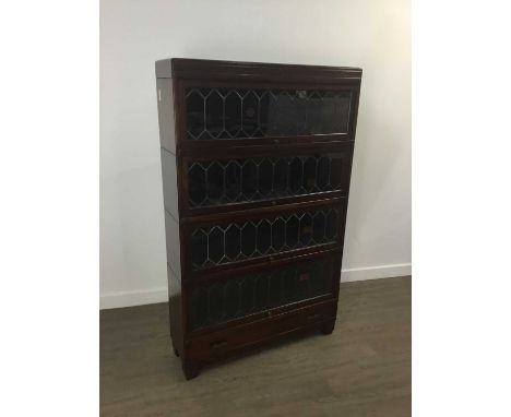 GLOBE WERNICKE MAHOGANY SECTIONAL BOOKCASE, EARLY 20TH CENTURY  with four leaded glass doors, on block feet 137cm high, 85cm 