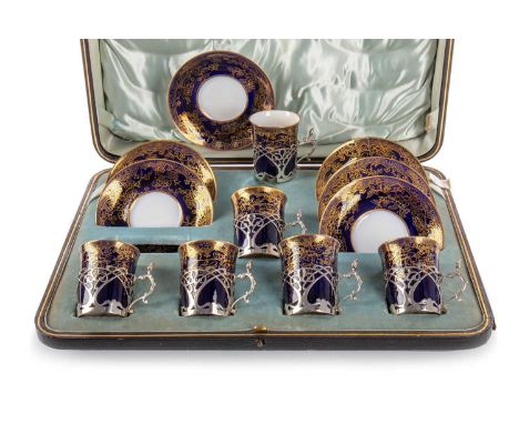 COPELAND SPODE, SILVER MOUNTED COFFEE SET, EARLY 20TH CENTURY comprising six cups and saucers, each decorated in gilt to coba