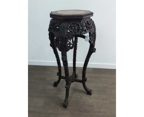 CHINESE HARDWOOD AND MARBLE JARDINIERE STAND, LATE 19TH / EARLY 20TH CENTURY the octagonal top inset rouge marble panel, bead