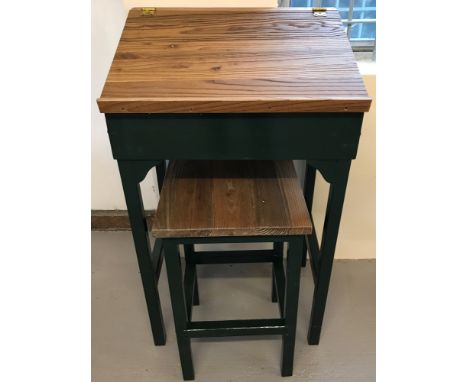 A vintage pine clerks desk and matching stool in natural wood and painted finish.Dark green painted framework with natural wo