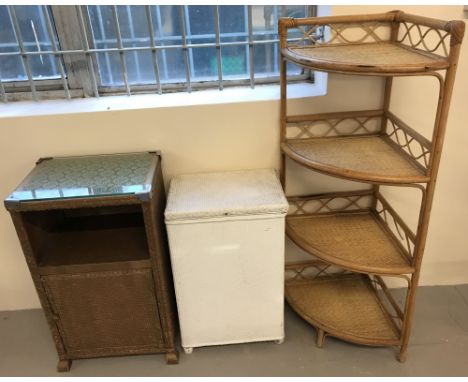 3 vintage basket weave items to include Lloyd Loom style.Comprising: a 4 shelf cane corner shelf, a small lidded linen basket