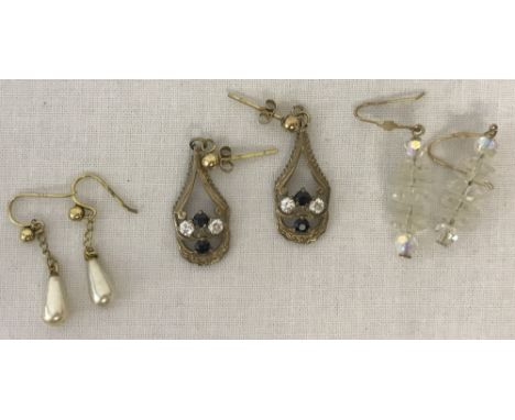 3 pairs of vintage 9ct gold earrings.Comprising: a pair of small faux pearl drops, chain and posts test as 9ct, a pair of cry