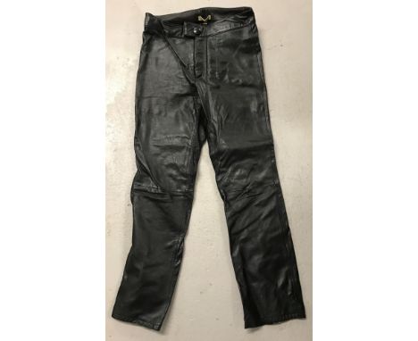 A pair of vintage ladies black leather trousers by "RomGorson".Rear button fastening pockets.Size 8.