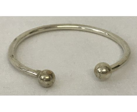 A modern torque design bangle. Marked 925.Total weight approx. 7.2g.