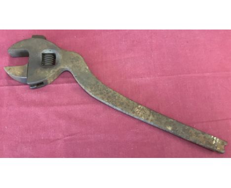 A vintage curve handled adjustable spanner, possibly Railway.Approx. 39cm long.