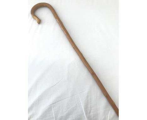 A vintage fell walking stick with hooked/crook handle.Approx. 124cm tall.
