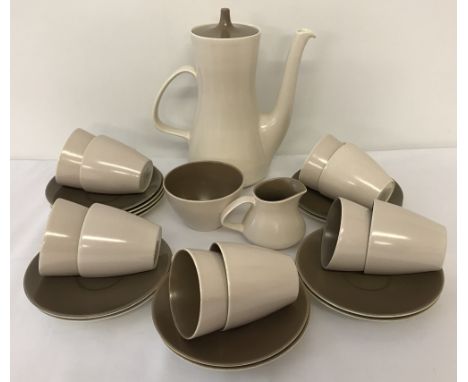 A vintage Poole Pottery ceramic coffee set in mushroom &amp; sepia colourway.Comprising: Coffee pot with lid, Milk jug, sugar