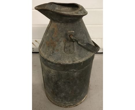 A vintage galvanised 5 gallon paraffin can, marked to side PB.Stamped with crown and ER mark and numbered 55.Approx. 53cm tal
