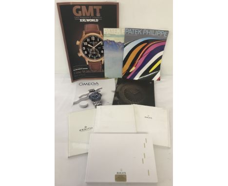 A collection of watch catalogues and magazines.Comprising: 3 x Rolex, Zenith, 3 x Patek Philippe, Omega and GMT magazine.