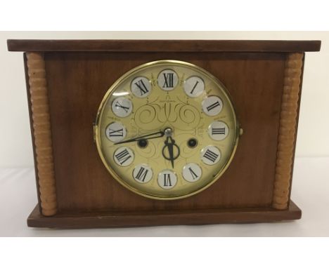 A vintage wooden cased Russian, Jantar chiming mantel clock.Wind up clock, complete with key. Two tone chime on the hour. In 