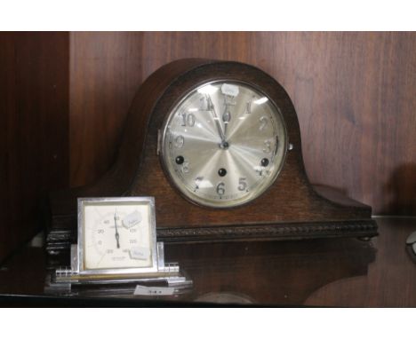 AN OAK NAPOLEON HAT MANTLE CLOCK TOGETHER WITH A THERMOMETER