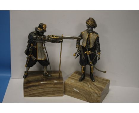 TWO SILVERED BRONZE FIGURES OF A TURK AND A MUSKATEER, BOTH SIGNED ANNA DAMESIN