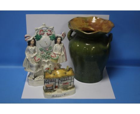 A CERAMIC VASE, A STAFFORDSHIRE STYLE FIGURE GROUP AND A CERAMIC MODEL OF SHAKESPEARE'S HOUSE